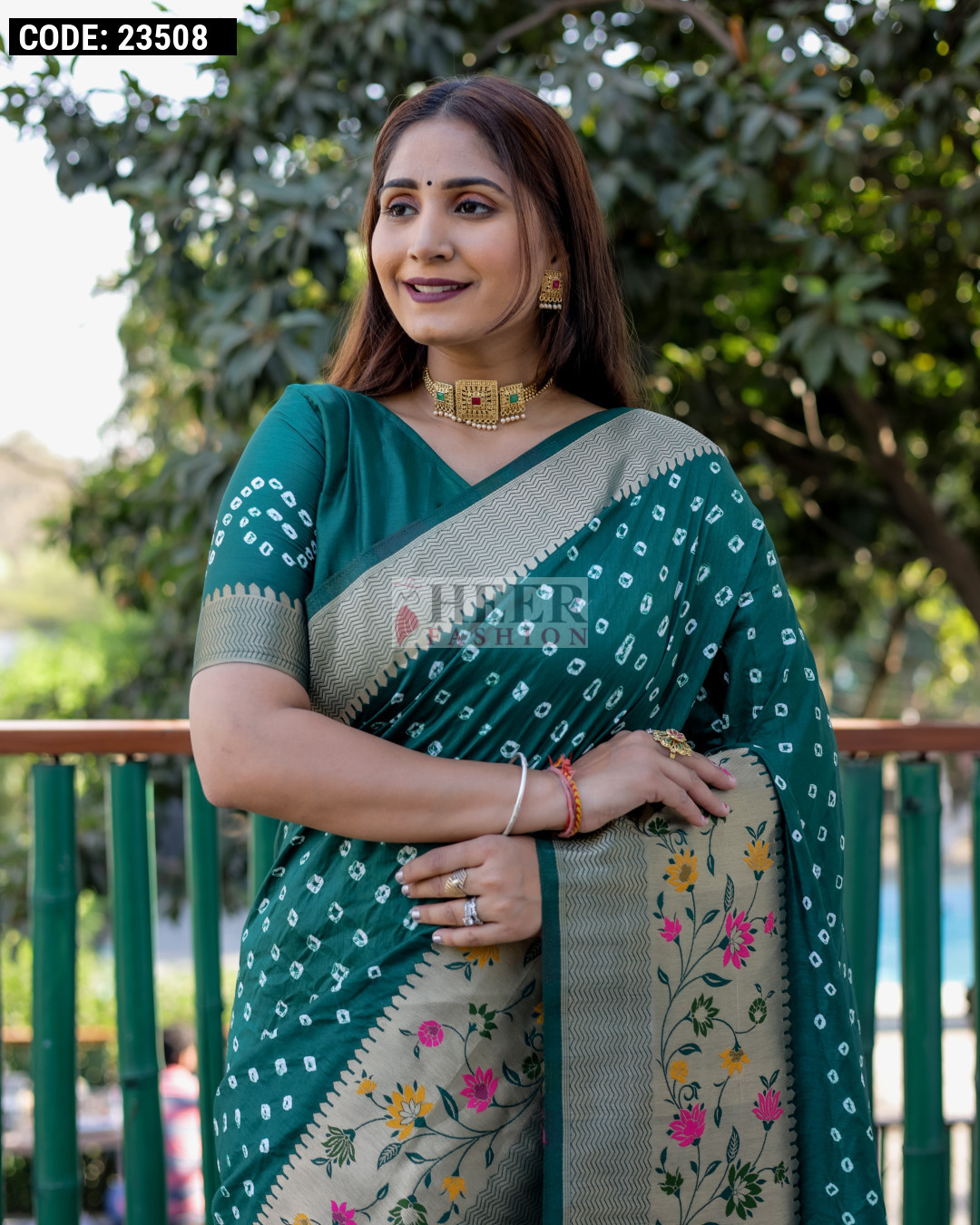 Bottle Green Color Bandhej Silk Saree With Zari Weaving Work