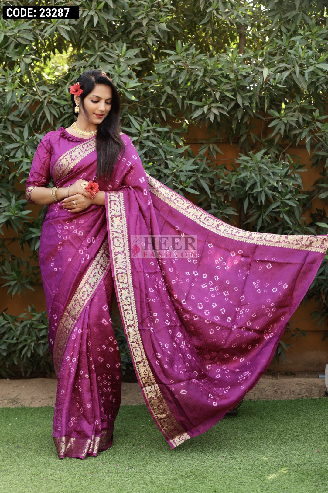 Magenta Color Bandhej Silk Saree With Zari Weaving Work