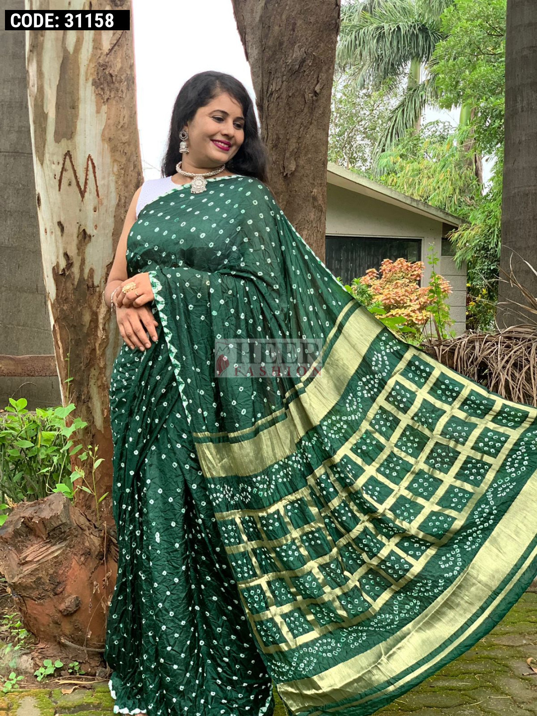 Green Color Hand Bandhej Silk Saree With Zari Weaving Work