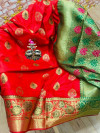Red colored Soft banarasi silk saree with woven design