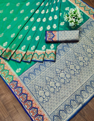 Rama green color banarasi soft silk saree with zari weaving work