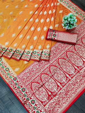 Orange color banarasi soft silk saree with zari weaving work