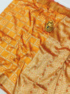 Orange color bandhani saree with golden zari weaving work