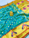 Green color paithani silk  saree with zari border