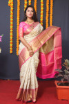 Off white color kanchipuram silk saree with zari woven work