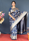 Navy blue color kanchipuram silk saree with  zari woven work