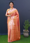 Orange color soft muslin silk saree with woven work