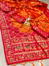 Orange color bandhani silk saree with golden zari weaving work