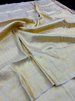 Off white color soft silk saree with zari  weaving work