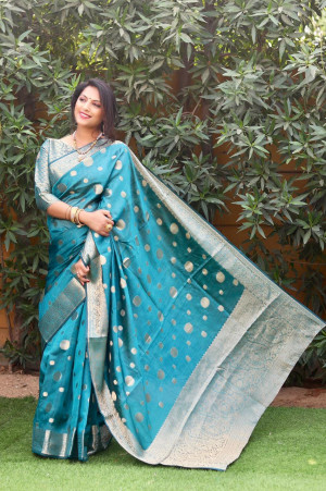 Rama green color organza silk saree with golden zari weaving work