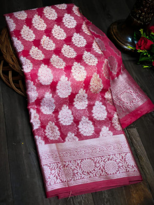 Pink color organza silk saree with silver zari weaving butti