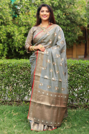 Gray color organza silk saree with zari weaving work