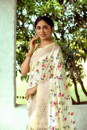 Yellow color linen saree with embroidered and stone work