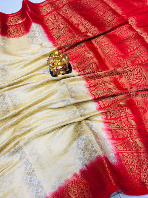 Off white color pure muslin silk saree with golden zari weaving work