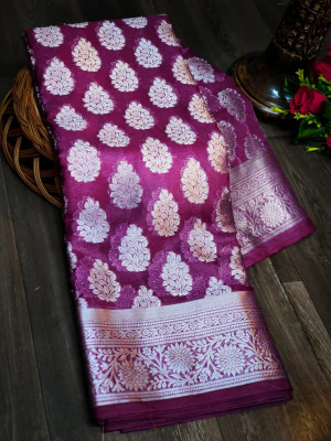 Magenta color organza silk saree with silver zari weaving butti