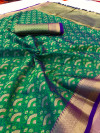 Green color muslin silk saree with zari woven work