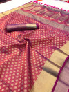 Rani pink color muslin silk saree with zari woven work