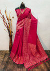 Pink color raw silk saree with woven design