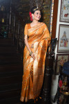 Mustard yellow color tussar silk saree with zari woven work
