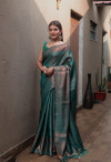 Rama green color kanchipuram silk saree with zari woven work