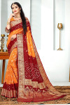 Orange and maroon color bandhej silk saree with zari weaving work