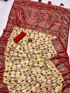 Beige color patola silk saree with printed work