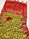 Mahendi green color patola silk saree with printed work