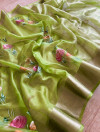 Mahendi green color organza silk saree with printed work