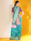 Rama green color soft raw silk saree with woven design
