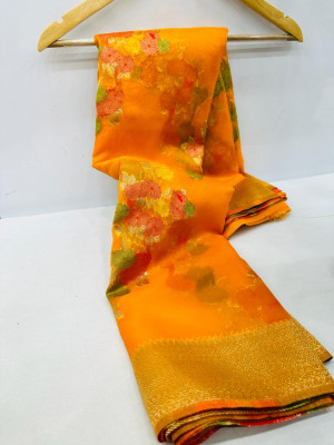 Orange color soft organza silk saree with woven design
