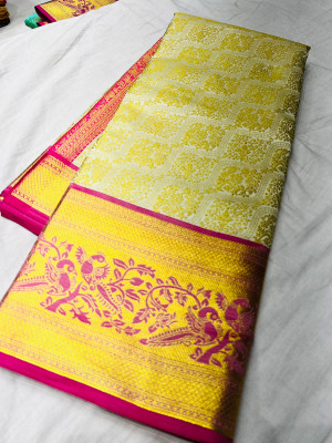 Off white color kanchipuram silk saree with zari weaving work