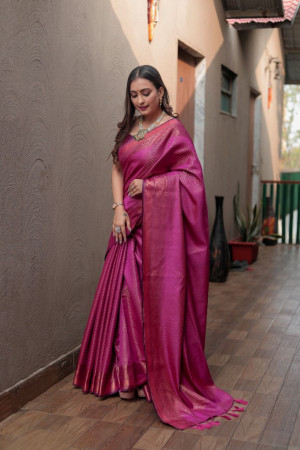Rani pink color soft fancy silk saree with zari woven work