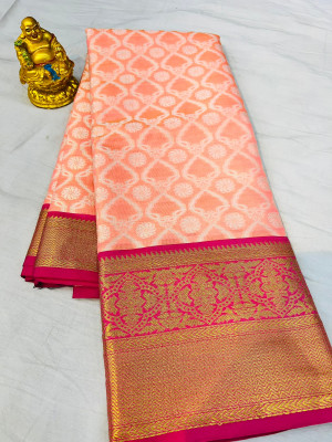 Peach color tissue silk saree with woven design
