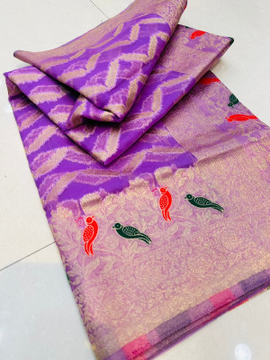 Lavender color organza silk saree with zari weaving work