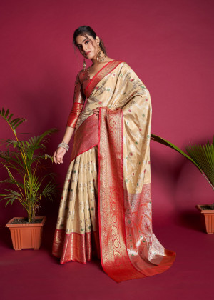 Off white color banarasi silk saree with zari woven work