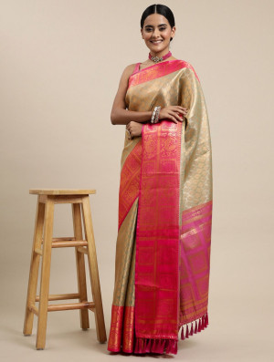 Beige color kanchipuram silk saree with zari weaving work