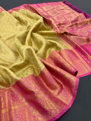 Beige color kanchipuram silk saree with zari weaving work