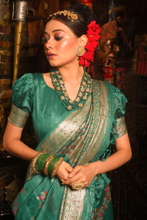 Rama green color tussar silk saree with zari woven work