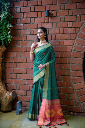 Bottle green color soft raw silk saree with woven design