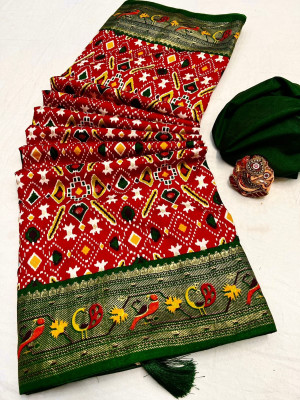 Red color patola silk saree with printed work