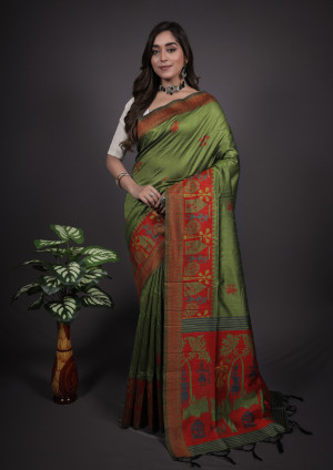 Mahendi green color handloom raw silk saree with zari woven work