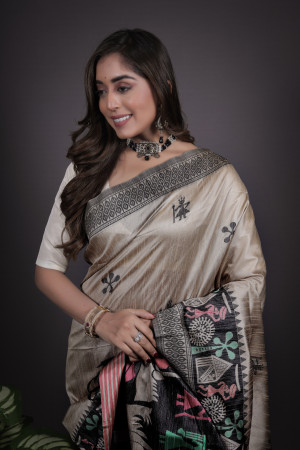 Off white color handloom raw silk saree with zari woven work