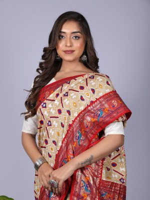 Beige color patola silk saree with printed work
