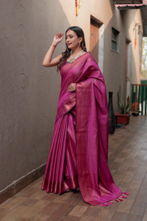 Rani pink color soft fancy silk saree with zari woven work
