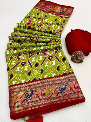 Mahendi green color patola silk saree with printed work