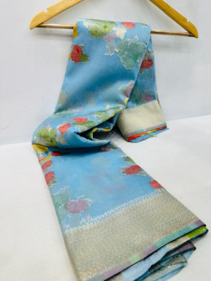 Sky blue color soft organza silk saree with woven design