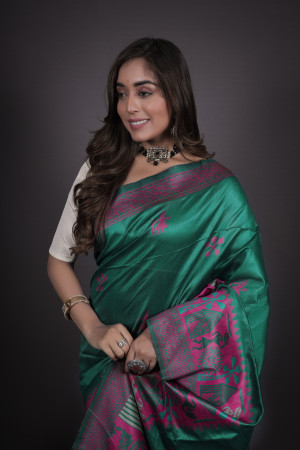 Rama green color handloom raw silk saree with zari woven work