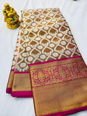 Brown color tissue silk saree with woven design