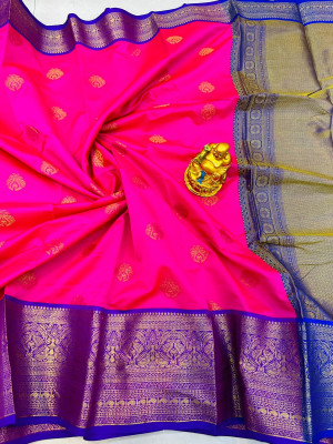 Rani pink color banarasi silk saree with zari weaving work