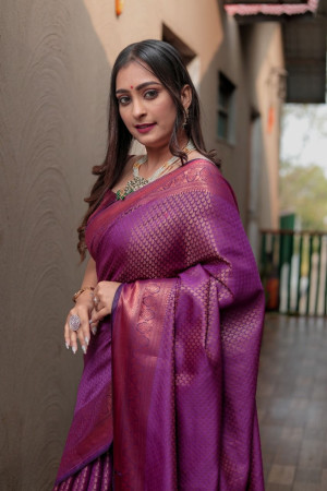 Magenta color soft fancy silk saree with zari woven work